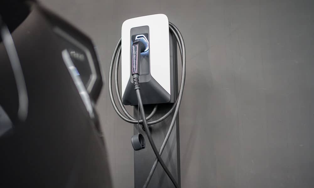 Proper EV charger installations with a Level 2 home charging station mounted on a wall