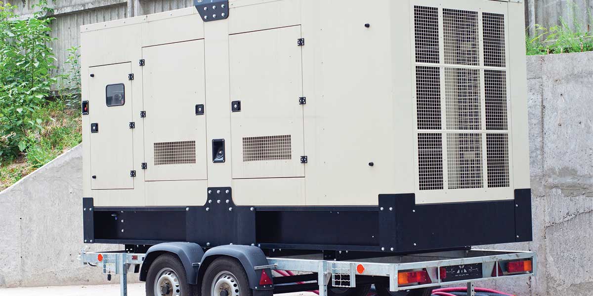 A large, heavy-duty standby generator installed on a trailer, offering reliable backup power for emergencies. This image features a robust generator built for long-term power needs and automatic activation during outages. For homes or businesses, it's an essential option when choosing the right generator for emergencies. Expert Electric specializes in installing these durable and efficient generators.