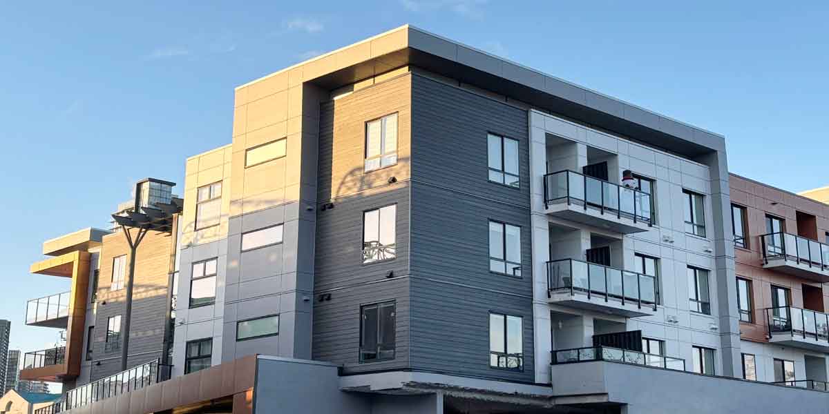 Greater Vancouver condo on a sunny day with a blue sky.