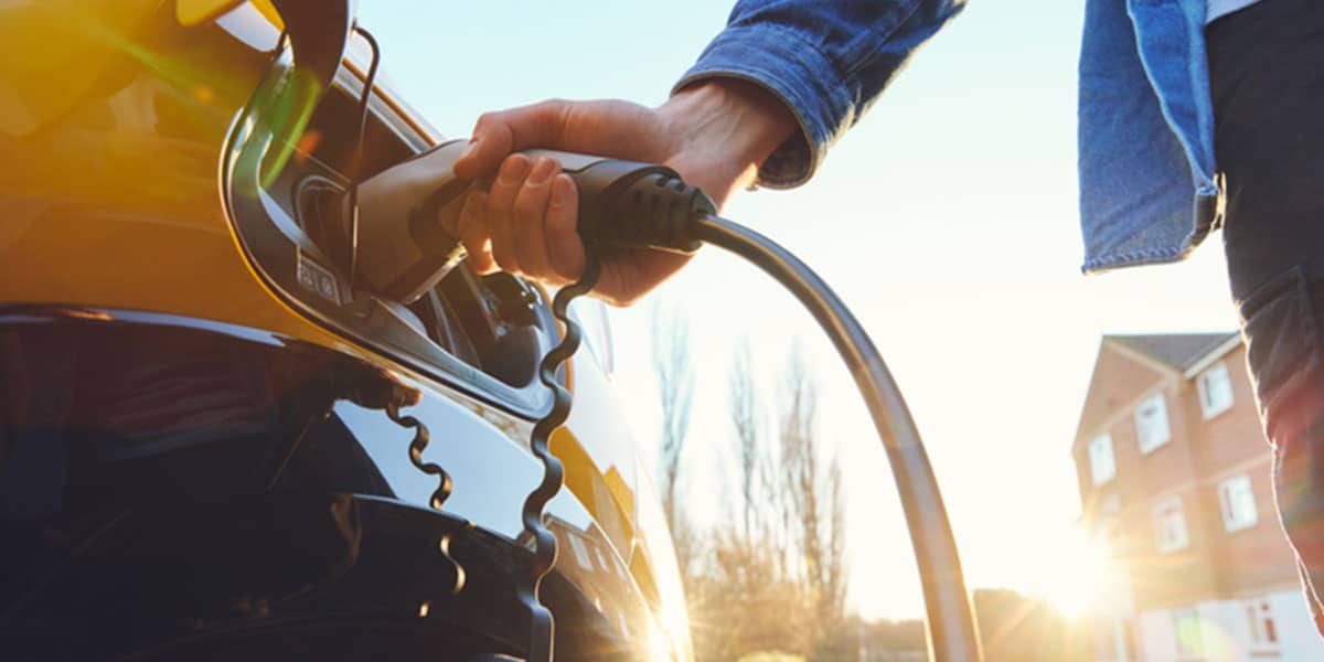 Electric car vs gas car cost breakdown highlighting lower EV charging cost and reduced maintenance