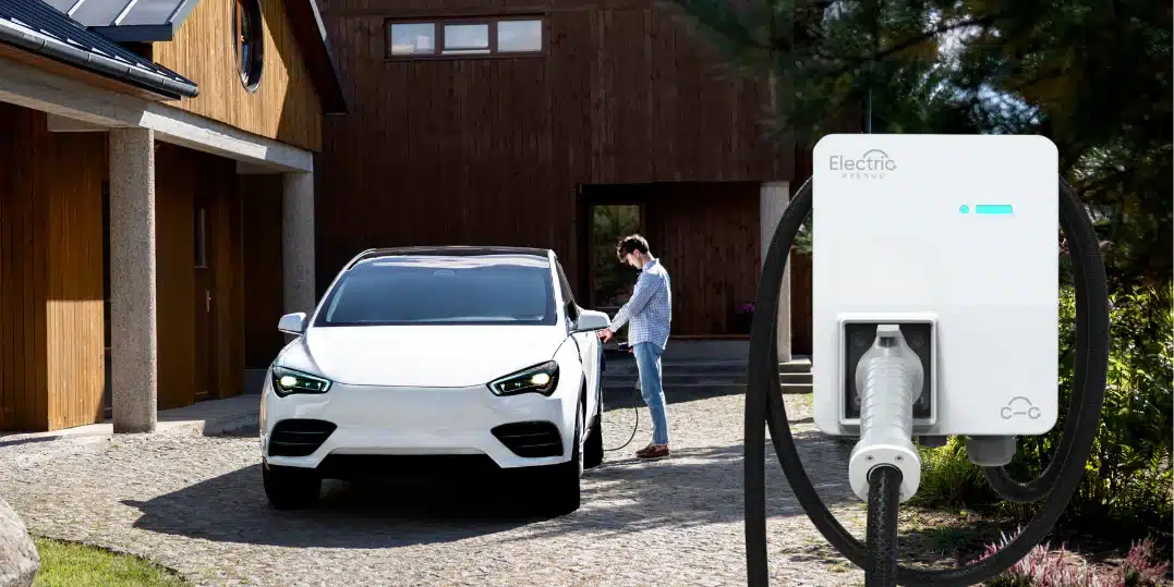 Person charging their car with an Electric Avenue EV Charger