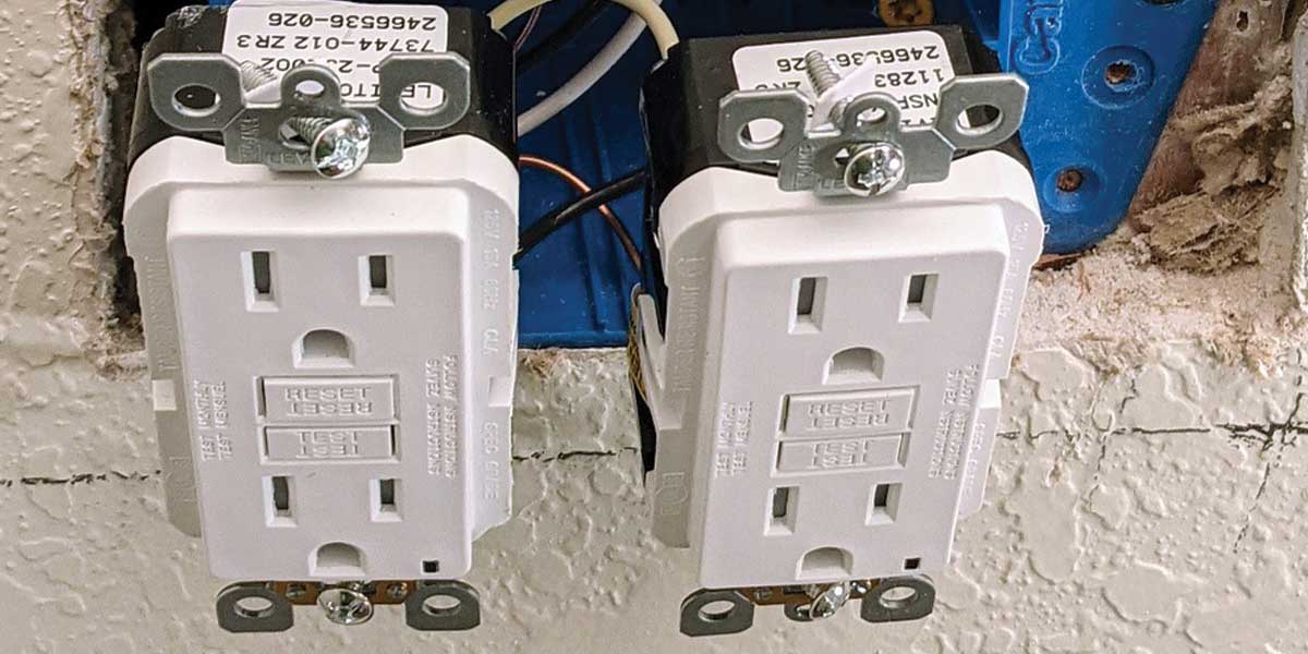 What is a tamper-resistant receptacle