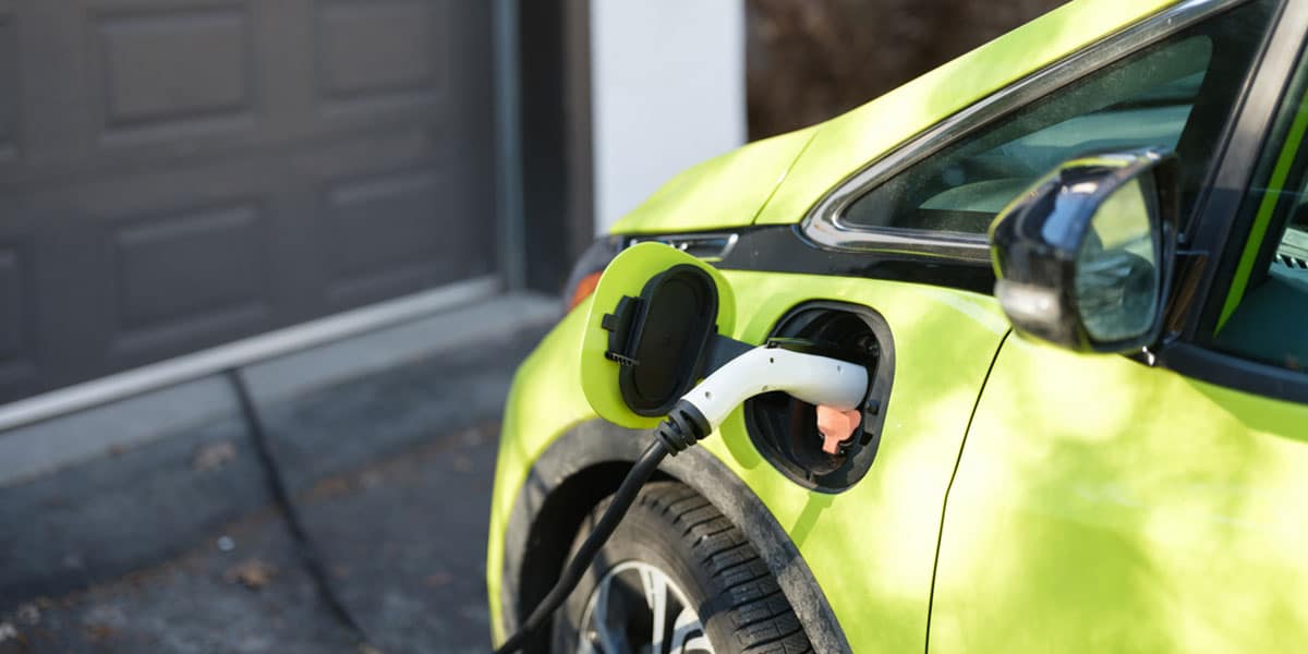 Electric car vs gas car cost comparison showing EV charging savings versus high fuel prices in British Columbia